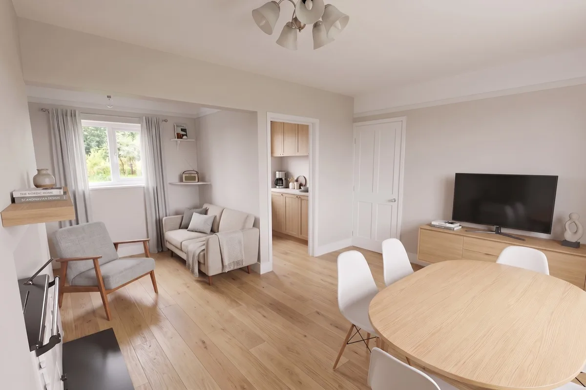 Refurbished living and dining room with light floors, neutral walls and a prepared seating area